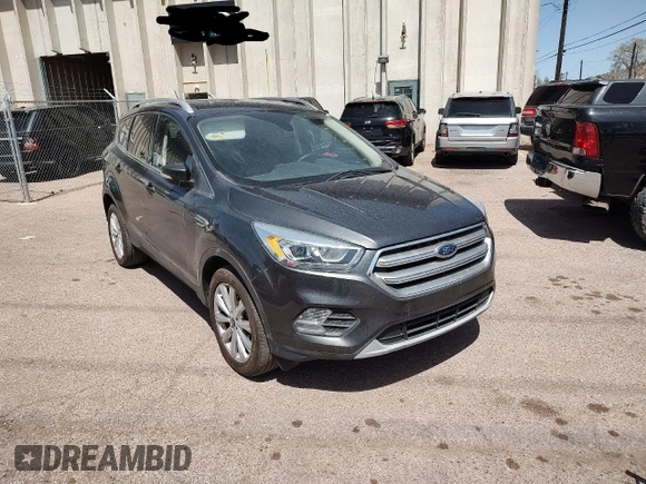 2017 Ford Escape Titanium with VIN 1FMCU9JD0HUC09357, listed as a Copart auction lot 52772915 with 99,062 mi miles and Clean Title. Bid and sale history available at carsss.com. Image 1.