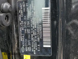 2014 Hyundai Veloster z VIN KMHTC6AD0EU188863, wystawiony jako Copart lot #54750925 z przebiegiem 96 212 mil mil oraz Szkoda całkowita • Salvage title. Historia ofert i sprzedaży dostępna na DreamBid. Obrazek 13.