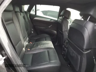 2013 BMW X6 xDrive50i z VIN 5UXFG8C57DL591149, wystawiony jako Copart lot #56979865 z przebiegiem 94 251 mil mil oraz Szkoda całkowita • Salvage title. Historia ofert i sprzedaży dostępna na DreamBid. Obrazek 12.