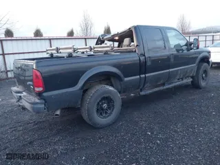 2004 Ford Super Duty F-250 XL with VIN 1FTNW21S24EA89210, listed as a IAAI auction lot 41219466 with 169,983 mi miles. Bid and sale history available at carsss.com. Image 4.