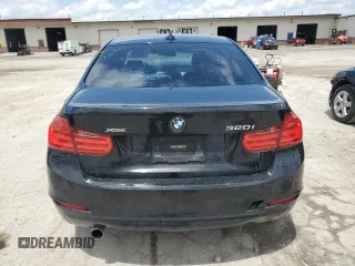 2014 BMW 3 Series 320i xDrive with VIN WBA3C3G51ENS72023, listed as a Copart auction lot 58595225 with 104,315 mi miles and Salvage title. Bid and sale history available at DreamBid. Image 6.