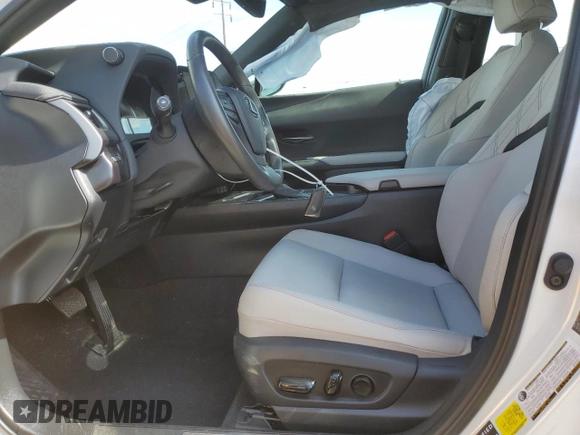 2024 Lexus UX with VIN JTHX6JBHXR2168962, listed as a Copart auction lot 51153075 with 7,080 mi miles and Salvage Title. Bid and sale history available at carsss.com. Image 7.