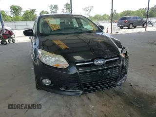 2012 Ford Focus SE with VIN 1FAHP3F29CL346226, listed as a Copart auction lot 61029345 with 172,533 mi miles and Salvage title. Bid and sale history available at DreamBid. Image 13.