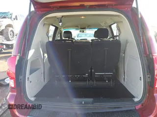 2014 Dodge Grand Caravan American Value with VIN 2C4RDGBG6ER260219, listed as a IAAI auction lot 41516864 with 162,293 mi miles and . Bid and sale history available at DreamBid. Image 17.