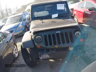 2010 Jeep Wrangler Sport with VIN 1J4AA2D16AL212492, listed as a IAAI auction lot 41656955 with 225,718 mi miles and . Bid and sale history available at carsss.com. Image 11.