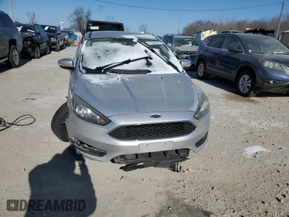 2016 Ford Focus SE with VIN 1FADP3F26GL332241, listed as a Copart auction lot 41868995 with 162,401 mi miles and Salvage Title. Bid and sale history available at DreamBid. Image 5.