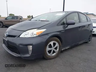 2015 Toyota Prius Four z VIN JTDKN3DU6F1977249, wystawiony jako IAAI lot #42490112 z przebiegiem 173 479 mil mil oraz . Historia ofert i sprzedaży dostępna na DreamBid. Obrazek 2.
