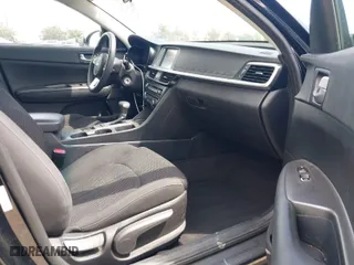 2019 Kia Optima S with VIN 5XXGT4L34KG296953, listed as a IAAI auction lot 42014999 with 64,968 mi miles. Bid and sale history available at carsss.com. Image 5.