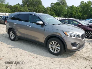 2017 Kia Sorento LX with VIN 5XYPG4A58HG286830, listed as a Copart auction lot 57672905 with 147,093 mi miles and Salvage title. Bid and sale history available at DreamBid. Image 4.