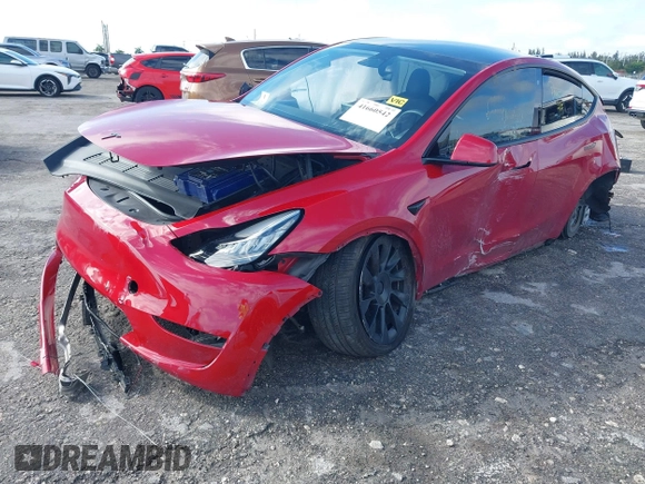 2022 Tesla Model Y Long Range z VIN 7SAYGDEE1NF385414, wystawiony jako IAAI lot #41660542 z przebiegiem 54 075 mil mil oraz . Historia ofert i sprzedaży dostępna na DreamBid. Obrazek 17.