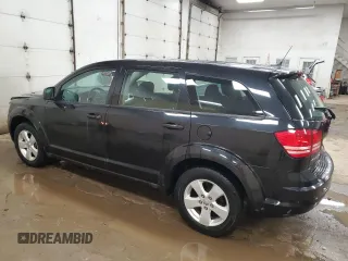 2013 Dodge Journey American Value with VIN 3C4PDCAB9DT505726, listed as a Copart auction lot 87948955 with 113,541 mi miles and Clean Title. Bid and sale history available at DreamBid. Image 2.
