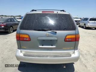 1998 Toyota Sienna LE with VIN 4T3ZF13C4WU064791, listed as a Copart auction lot 61411865 with 218,835 mi miles and Salvage title. Bid and sale history available at DreamBid. Image 6.