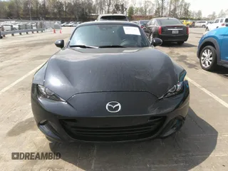 2021 Mazda MX-5 Miata Grand Touring z VIN JM1NDAM75M0451597, wystawiony jako IAAI lot #41932712 z przebiegiem 61 710 mil mil oraz . Historia ofert i sprzedaży dostępna na DreamBid. Obrazek 12.