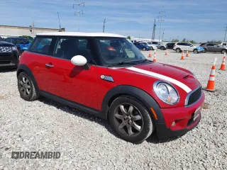 2009 MINI Hardtop S with VIN WMWMF73599TW87973, listed as a Copart auction lot 53343985 with 73,742 mi miles and Salvage Title. Bid and sale history available at DreamBid. Image 4.