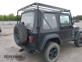 2000 Jeep Wrangler Sahara with VIN 1J4FA59S7YP805628, listed as a IAAI auction lot 42259201 with Not provided miles and . Bid and sale history available at DreamBid. Image 13.