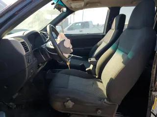 2007 GMC Canyon SLE1 with VIN 1GTCS13E678122233, listed as a Copart auction lot 77891234 with 218,980 mi miles and Salvage Title. Bid and sale history available at carsss.com. Image 7.