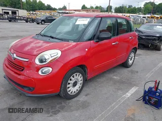 2014 FIAT 500L Pop z VIN ZFBCFAAH9EZ014149, wystawiony jako IAAI lot #42390142 z przebiegiem 106 227 mil mil oraz . Historia ofert i sprzedaży dostępna na DreamBid. Obrazek 2.