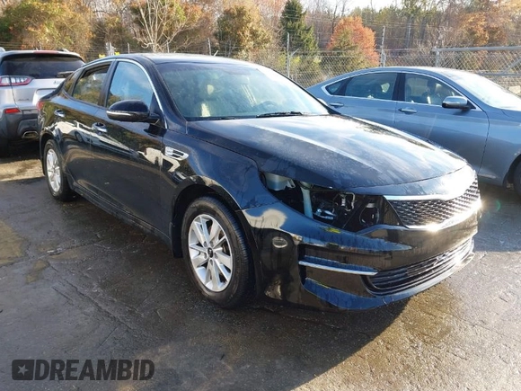 2016 Kia Optima LX z VIN 5XXGT4L30GG076989, wystawiony jako IAAI lot #41835878 z przebiegiem 150 567 mil mil oraz . Historia ofert i sprzedaży dostępna na DreamBid. Obrazek 1.