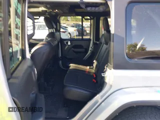 2023 Jeep Wrangler Willys with VIN 1C4HJXDG3PW577807, listed as a IAAI auction lot 42323674 with 28,808 mi miles and . Bid and sale history available at DreamBid. Image 8.