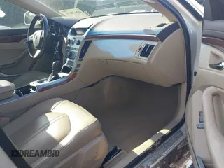 2010 Cadillac CTS Luxury with VIN 1G6DE5EG9A0118042, listed as a IAAI auction lot 42448076 with 142,359 mi miles and . Bid and sale history available at DreamBid. Image 5.