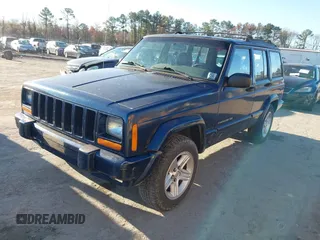 2001 Jeep Cherokee Sport with VIN 1J4FF58S01L527395, listed as a IAAI auction lot 41829601 with 265,465 mi miles and . Bid and sale history available at DreamBid. Image 2.