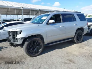 2020 Chevrolet Tahoe LS with VIN 1GNSCAKC2LR227856, listed as a IAAI auction lot 42246510 with 55,132 mi miles and . Bid and sale history available at DreamBid. Image 2.
