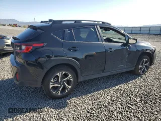 2024 Subaru Crosstrek Premium z VIN JF2GUADC8R8230480, wystawiony jako Copart lot #55782315 z przebiegiem 10 766 mil mil oraz Szkoda całkowita • Salvage title. Historia ofert i sprzedaży dostępna na DreamBid. Obrazek 3.