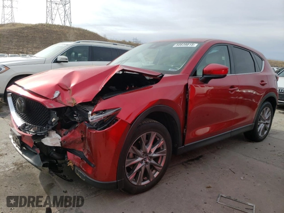 2021 Mazda CX-5 Grand Touring Reserve with VIN JM3KFBAY4M0358478, listed as a Copart auction lot 50839815 with 84,932 mi miles and Salvage Title. Bid and sale history available at DreamBid. Image 1.