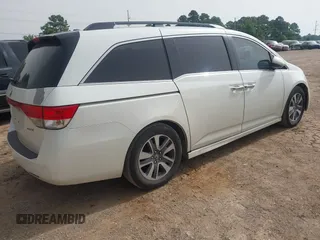 2015 Honda Odyssey Touring Elite with VIN 5FNRL5H96FB045968, listed as a IAAI auction lot 42263637 with 207,637 mi miles and . Bid and sale history available at DreamBid. Image 4.
