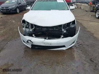 2014 Toyota Camry Hybrid LE with VIN 4T1BD1FK1EU102768, listed as a IAAI auction lot 41793746 with 157,015 mi miles. Bid and sale history available at carsss.com. Image 6.