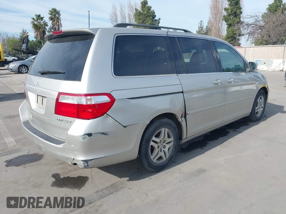 2005 Honda Odyssey EX-L with VIN 5FNRL38675B422980, listed as a IAAI auction lot 41680392 with 188,145 mi miles. Bid and sale history available at carsss.com. Image 4.