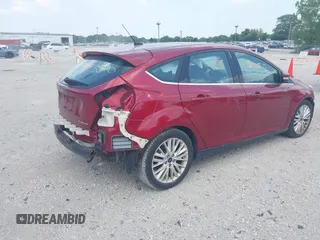 2017 Ford Focus Titanium with VIN 1FADP3N24HL294690, listed as a IAAI auction lot 39893510 with 123,089 mi miles and . Bid and sale history available at DreamBid. Image 4.