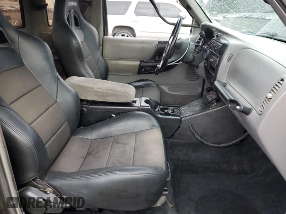 1997 Ford Ranger XLT with VIN 1FTCR15X8VPB38589, listed as a Copart auction lot 80037124 with 212,826 mi miles and Salvage Title. Bid and sale history available at DreamBid. Image 7.