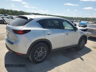 2020 Mazda CX-5 Touring z VIN JM3KFBCM2L1824072, wystawiony jako Copart lot #54825295 z przebiegiem 99 420 mil mil oraz Szkoda całkowita • Salvage title. Historia ofert i sprzedaży dostępna na DreamBid. Obrazek 3.