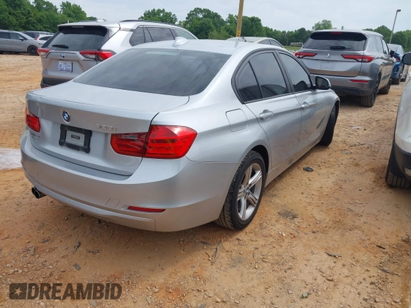 2015 BMW 3 Series 328i with VIN WBA3A5C59FP605386, listed as a IAAI auction lot 42309429 with 164,463 mi miles and . Bid and sale history available at DreamBid. Image 4.