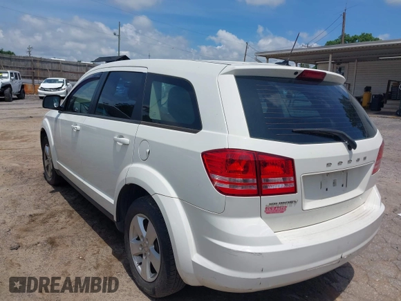 2013 Dodge Journey American Value with VIN 3C4PDCAB2DT587430, listed as a IAAI auction lot 42229391 with 218,016 mi miles and . Bid and sale history available at DreamBid. Image 3.