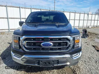 2023 Ford F-150 XL with VIN 1FTFW1E53PKG07088, listed as a IAAI auction lot 41442237 with 21,403 mi miles. Bid and sale history available at carsss.com. Image 13.