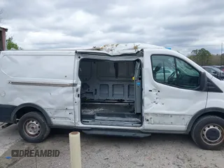 2023 Ford Transit Cargo with VIN 1FTBR1Y85PKA34934, listed as a IAAI auction lot 41768055 with 47,840 mi miles and . Bid and sale history available at DreamBid. Image 14.