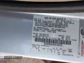 2012 Ford Fusion S with VIN 3FAHP0GA2CR143572, listed as a IAAI auction lot 41826526 with 199,083 mi miles. Bid and sale history available at carsss.com. Image 9.