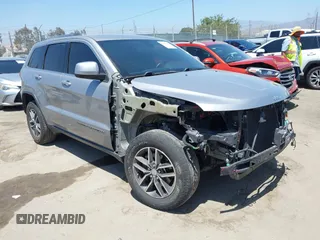 2018 Jeep Grand Cherokee Laredo E z VIN 1C4RJEAG2JC429850, wystawiony jako IAAI lot #42541574 z przebiegiem 72 009 mil mil oraz . Historia ofert i sprzedaży dostępna na DreamBid. Obrazek 1.