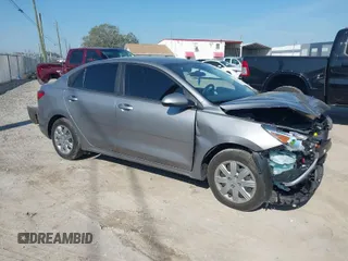 2023 Kia Rio S with VIN 3KPA24AD6PE611403, listed as a IAAI auction lot 41694267 with 26,251 mi miles. Bid and sale history available at carsss.com. Image 1.