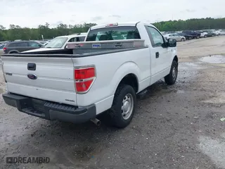 2014 Ford F-150 XL with VIN 1FTMF1CM5EKG22092, listed as a IAAI auction lot 41948999 with 156,233 mi miles. Bid and sale history available at carsss.com. Image 4.