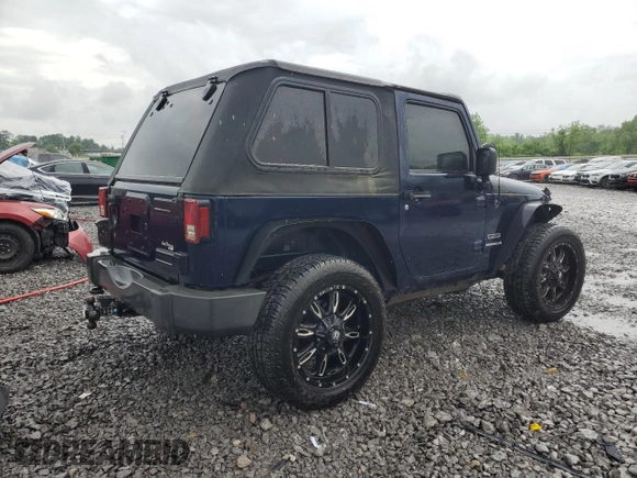 2013 Jeep Wrangler Sport with VIN 1C4AJWAG6DL590922, listed as a Copart auction lot 53379755 with 139,099 mi miles and Salvage title. Bid and sale history available at DreamBid. Image 3.