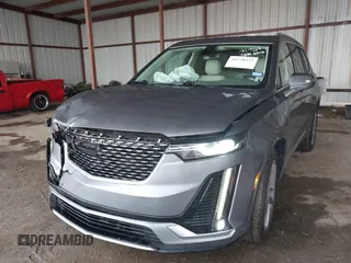 2022 Cadillac XT6 Premium Luxury z VIN 1GYKPDRS1NZ108012, wystawiony jako IAAI lot #41178333 z przebiegiem 83 987 mil mil oraz . Historia ofert i sprzedaży dostępna na DreamBid. Obrazek 2.