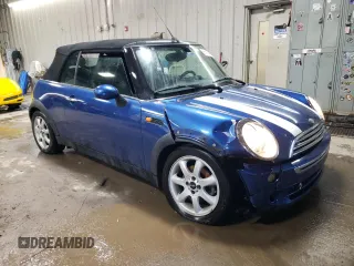 2007 MINI Convertible with VIN WMWRF33507TG16448, listed as a Copart auction lot 88474495 with 148,147 mi miles and Salvage Title. Bid and sale history available at DreamBid. Image 4.