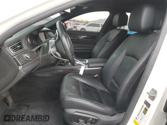 2013 BMW 7 Series 740i with VIN WBAYA6C55DC995290, listed as a Copart auction lot 82022284 with 128,882 mi miles and Salvage Title. Bid and sale history available at carsss.com. Image 7.