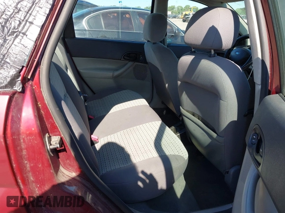 2007 Ford Focus S with VIN 1FAFP34N77W297780, listed as a IAAI auction lot 42074788 with 153,441 mi miles and . Bid and sale history available at carsss.com. Image 8.