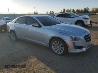 2014 Cadillac CTS Luxury AWD with VIN 1G6AX5S33E0197714, listed as a Copart auction lot 52496745 with 102,618 mi miles and Salvage Title. Bid and sale history available at DreamBid. Image 4.
