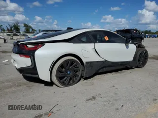 2015 BMW i8 z VIN WBY2Z2C50FV392795, wystawiony jako Copart lot #76099804 z przebiegiem Nie podano mil oraz Szkoda całkowita • Salvage title. Historia ofert i sprzedaży dostępna na DreamBid. Obrazek 3.