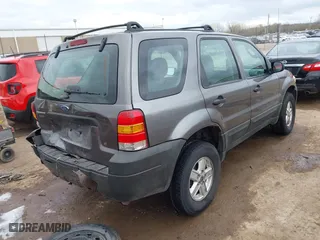 2006 Ford Escape XLS with VIN 1FMYU92ZX6KB10330, listed as a IAAI auction lot 41855529 with 249,548 mi miles. Bid and sale history available at carsss.com. Image 4.